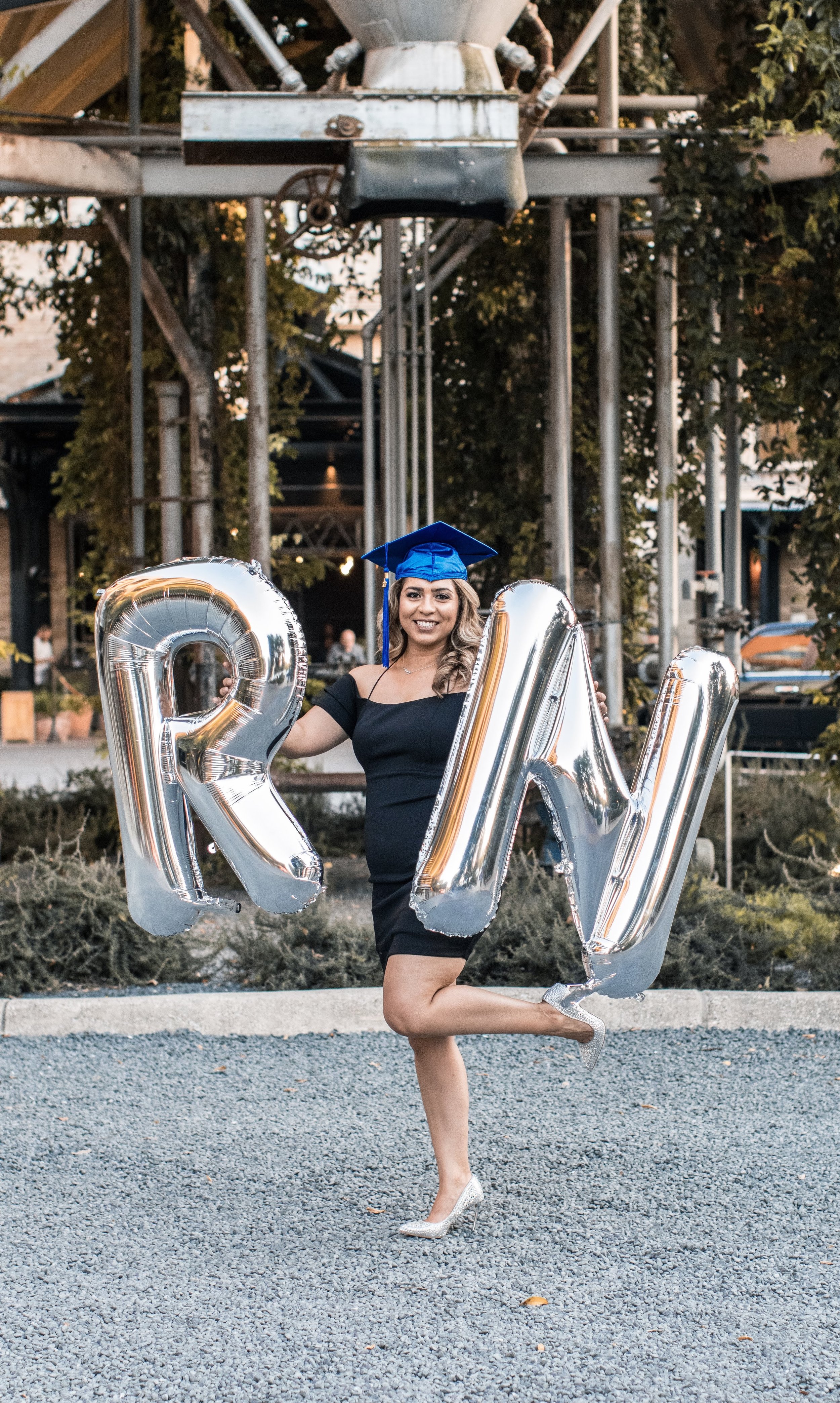 Graduate with RN balloons
